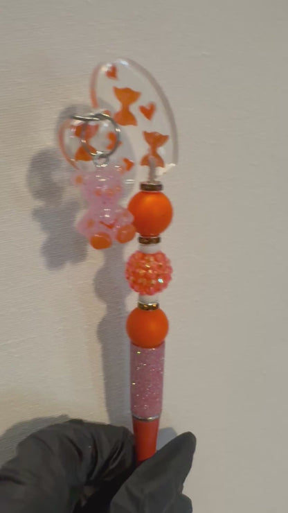 One-of-a-kind pen made with custom beads and resin🧡